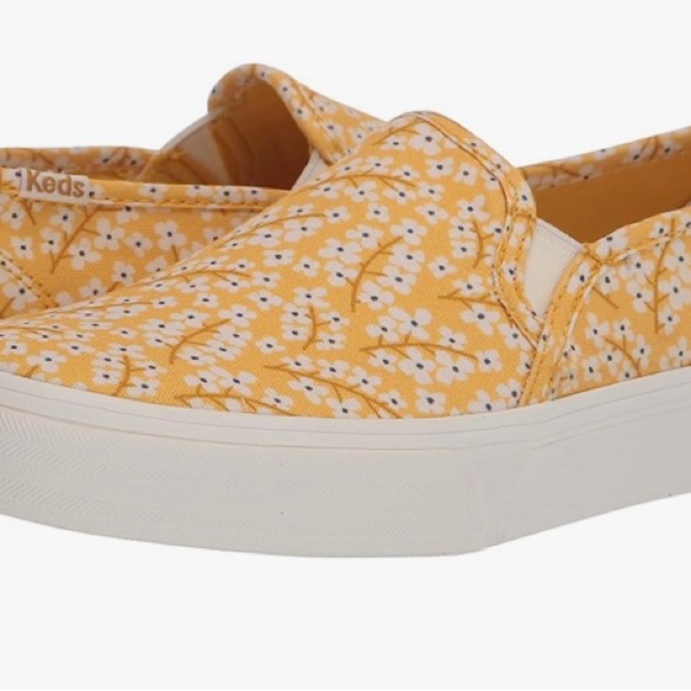 Women’s double-decker floral slip-on sneaker.